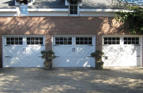 3 carriage house garage doors after professional installation