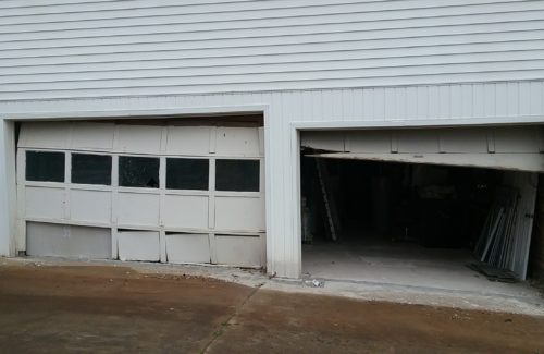 two broken garage doors in Lenoir North Carolina