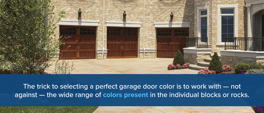 home with three brown garage doors